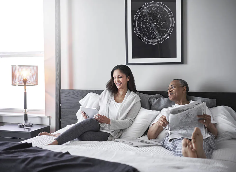 Cozy couple relaxing in bed